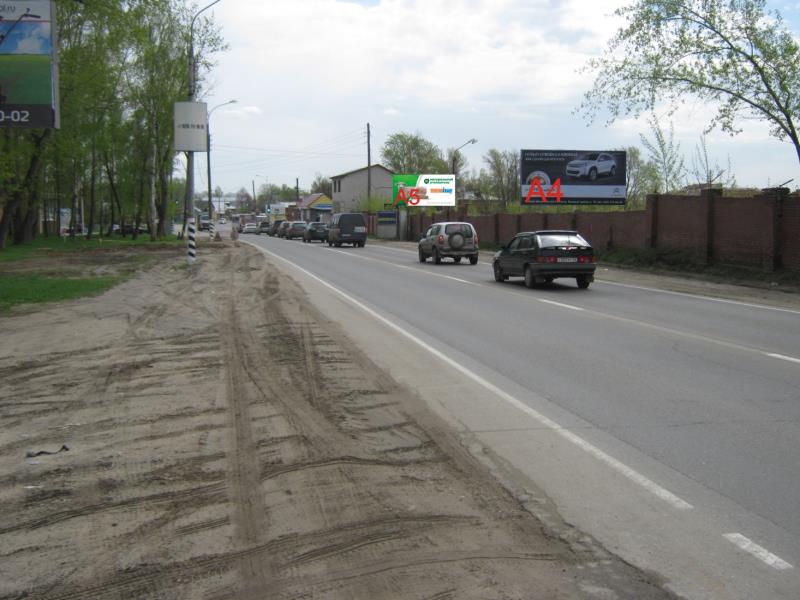Казанское шоссе,  щит 4 около автосалона Порше, Ауди