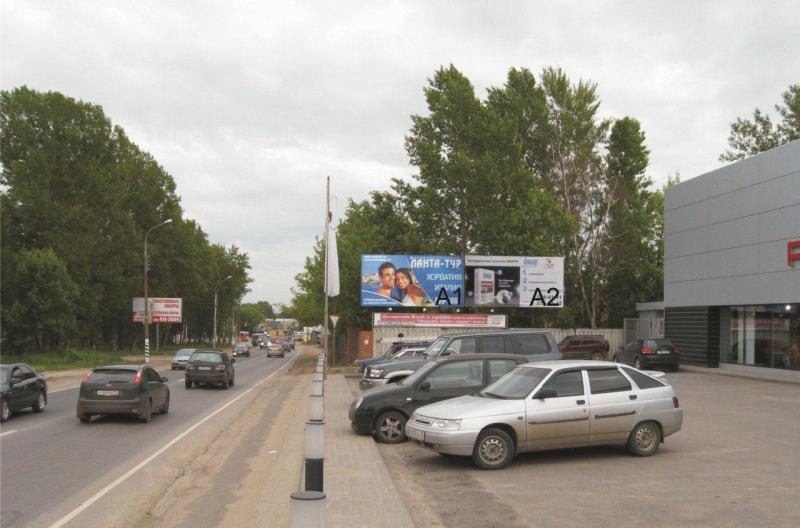 Казанское шоссе,  щит 2 около автосалона Порше, Ауди